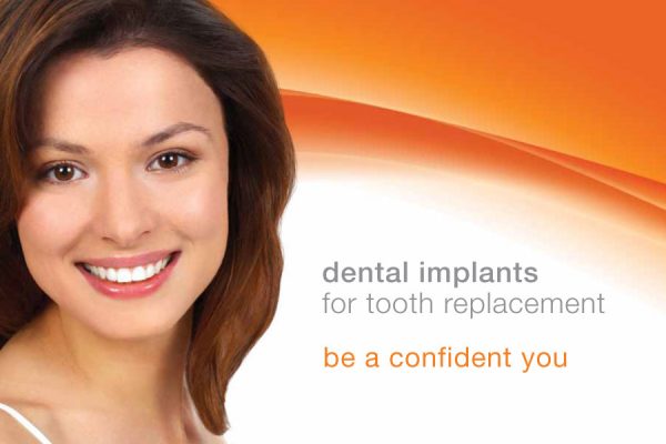a woman with brown hair smiles in front of an orange background with text about the benefits of dental implants
