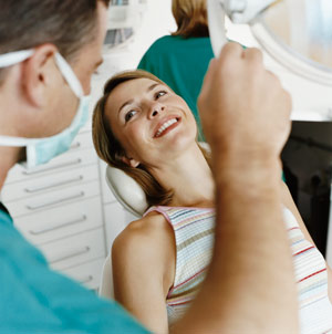 woman getting dental exam